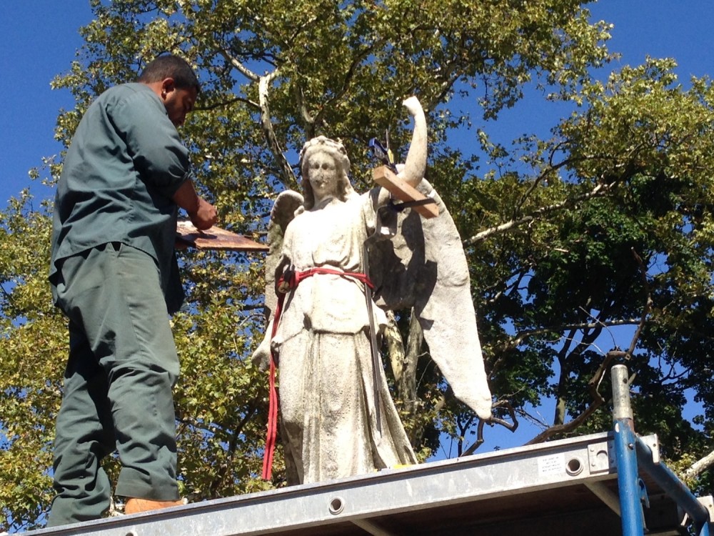 Gus Padilla of the Restoration Team, working on the Lloyd Angel.