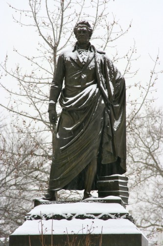 The Clinton Monument in winter. Note the books piled at the right; they symbolize his knowledge.