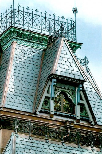 The restored cast iron cresting included this widow's walk atop the gatekeeper's residence.