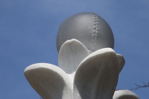 The 19th-century lemon-peel baseball, carved in marble.