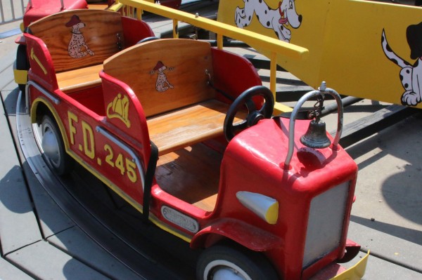 A Mangels fire engine car on the ride at Deno's Wonder Wheel Amusement Park.