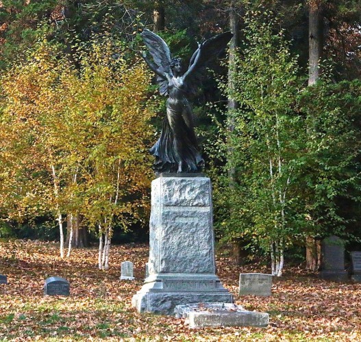 The great Valentine Angel, framed by birches. Note the contrast between the dark bronze monument and the white of the tree bark--that was Superintendent Art Presson's idea.