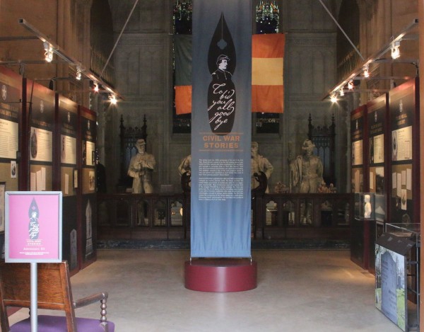 The center aisle of the exhibition, with the introductory text and 8 of the 20 Civil War Stories.