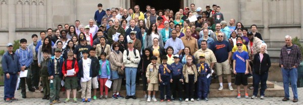 Volunteers, ready to place flags on 5,000 graves.