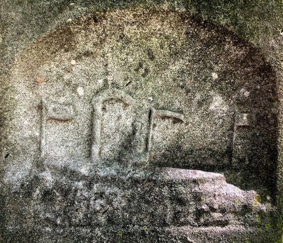 Detail of the ship carved into the monument.