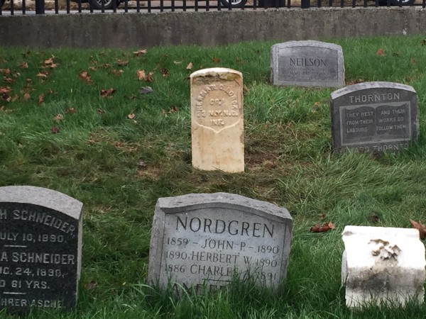 The century-old gravestone, reset to honor the service of Herman Lorck.