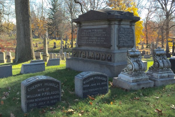 The Pitbladdo family lot at Green-Wood. Note the gravestones of William Pitbladdo and his wife, Cherry, at front. And notice that the gray granite is not the only material in the lot; two intricately-carved marble monuments are at right.