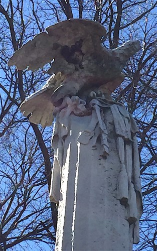 Detail of the top of the Colonel Vosburgh Monument. Vosburgh led the 71st New York State Militia down to Washington D.C. at the outbreak of the Civil War. Within weeks, he was dead of disease. Lincoln placed a wreath on his casket. The carved eagle, sash, and military belt symbolized his ultimate sacrifice for country.
