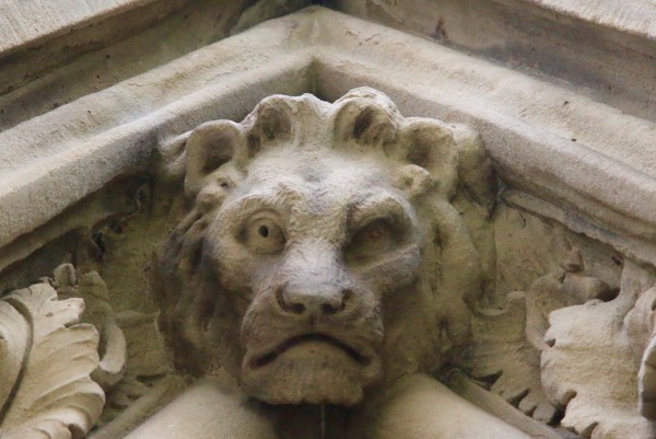 A lion adorns one of the eaves.