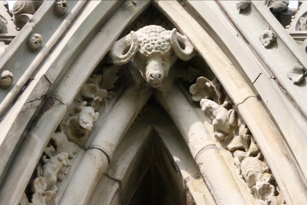 A ram. Note the small face at upper left, with mouth wide open.