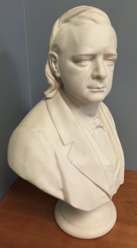 The bust of Henry Ward Beecher (1813-1887). He is interred at Green-Wood in section 139/140, lot 25911.