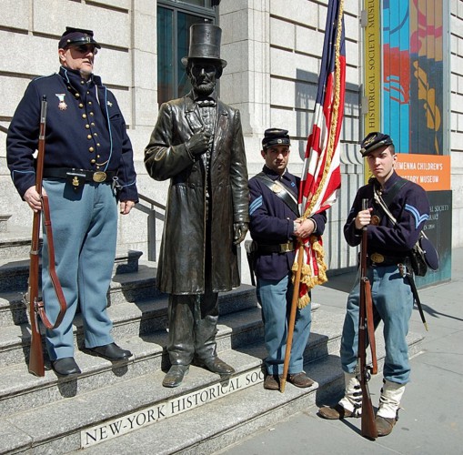 That's Greg Di Salvio at left, on the steps of the New-York Historical Society, with Abraham Lincoln (in bronze) and two of his fellow re-enactors.