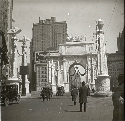 This Victory Arch, a temporary structure erected just to the west of Madison Square Park, was where the crowd surged into the streets to greet the marchers.