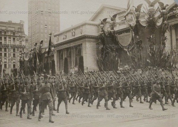 Parading in front of the New York Public Library. Courtesy of the New York City 