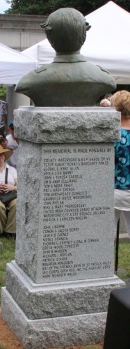 A list of the donors, who made the bronze sculpture and its granite base possible, appears on the back of the monument.