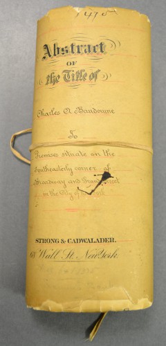 This packet of deeds and legal documents pertain to Charles A. Baudouine's real estate holdings.