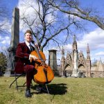 cellist near Green-Wood arches