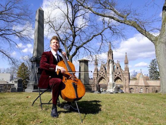 cellist near Green-Wood arches