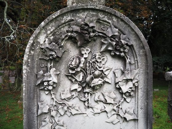 flowers carved into headstone
