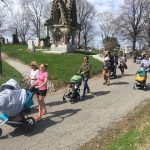 parents on cemetery stroller tour