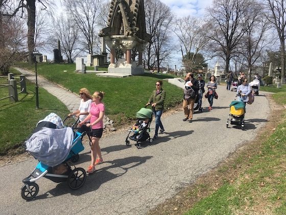parents on cemetery stroller tour
