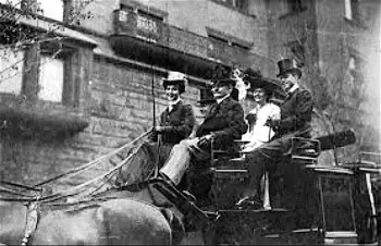 Gladys, in happier days, driving a coach in New York City.